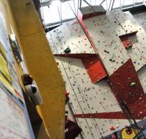 view of tall indoor climbing wall