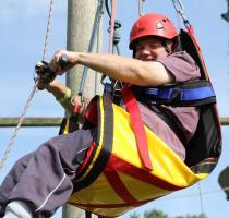 Man with disability using high ropes